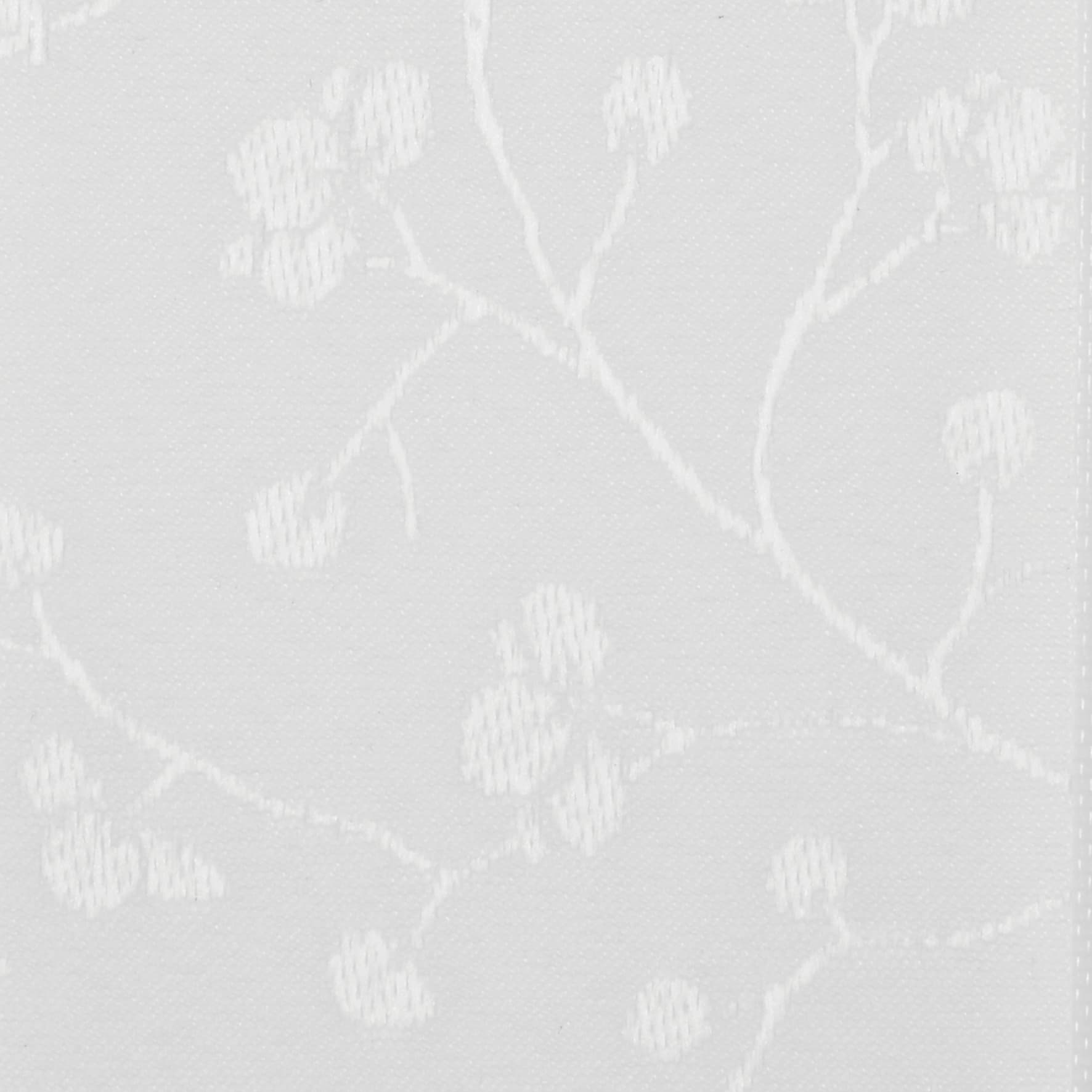 White jacquard curtain fabric with subtle raised vine-and-berry motif, hanging flat and filtering light; close-up shows woven texture and delicate embroidered appearance in a neutral, softly lit interior.