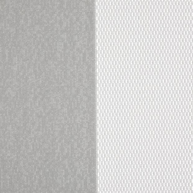 Two curtain panelsâ€”left opaque gray, right white sheer with small rectangular meshâ€”hang side-by-side, the sheer diffusing light while the opaque blocks it; close-up interior view.