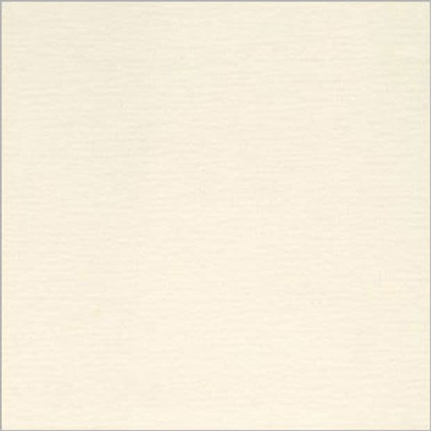 Beige fabric roller blind, lowered, smooth slightly textured surface with a narrow grey frame; blocking light and casting diffuse, soft illumination in a neutral, evenly lit interior.