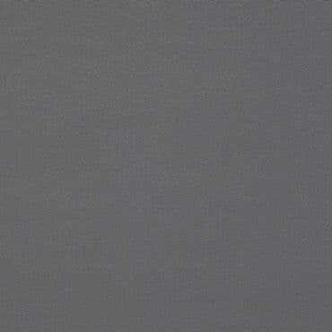 Gray textured fabric swatch, fine woven pattern, lying flat and filling the frame; evenly lit, neutral tone with subtle speckling and a faint diagonal weave visible.