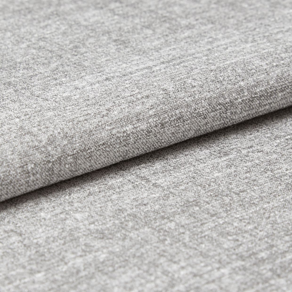 Gray woven upholstery fabric folded in a neat horizontal overlap, revealing a textured weave and soft pile; close-up studio view with even, diffuse lighting and a neutral background.