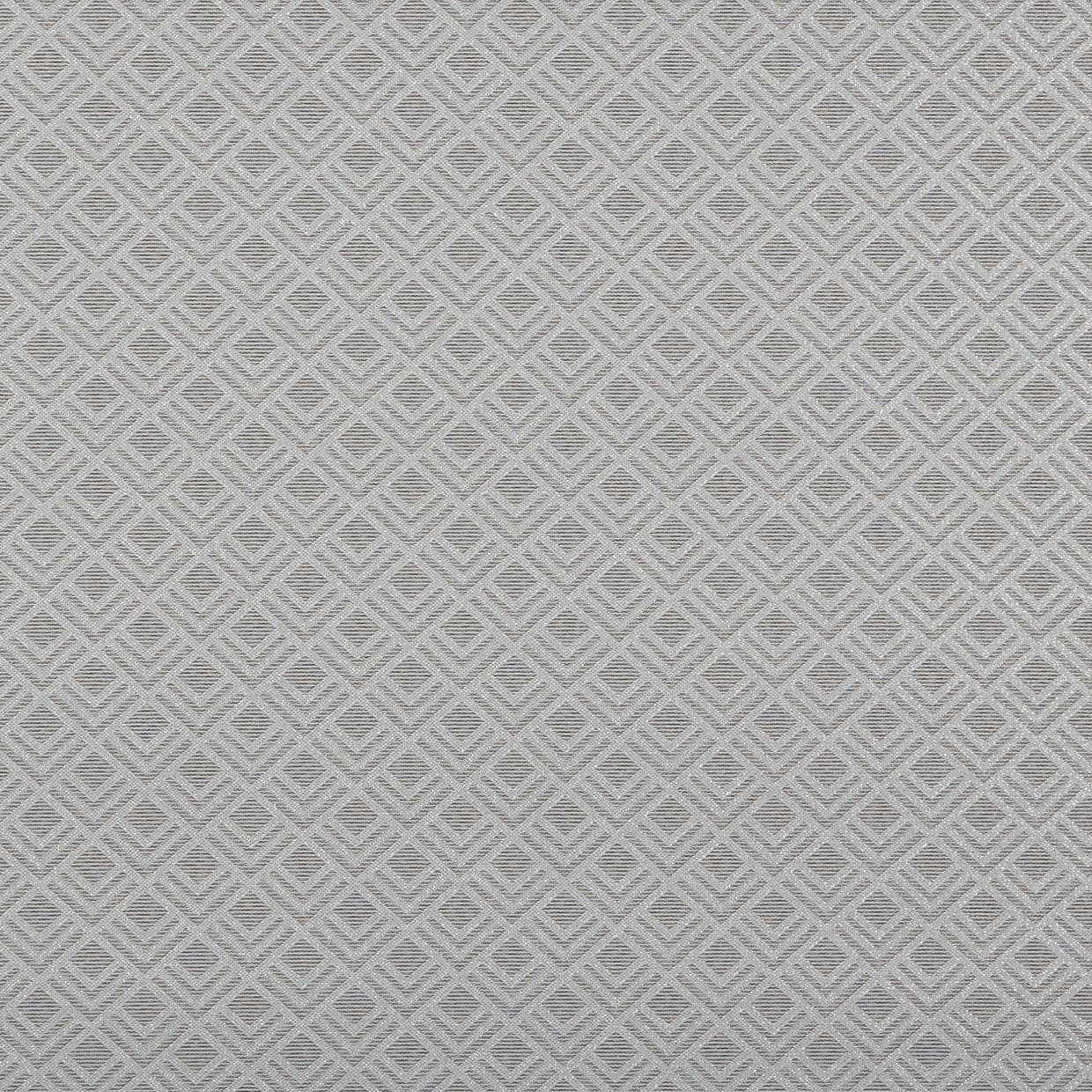 Grey woven textile with raised diamond lattice pattern, covering a flat surface and lying taut, shown in a close-up indoor view with subtle shadows and neutral, even lighting.