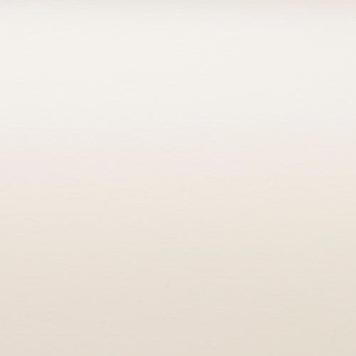 Cream-colored wall with subtle paperlike texture, unadorned and evenly lit, occupying the frame as a neutral backdrop in a softly lit interior or studio environment.