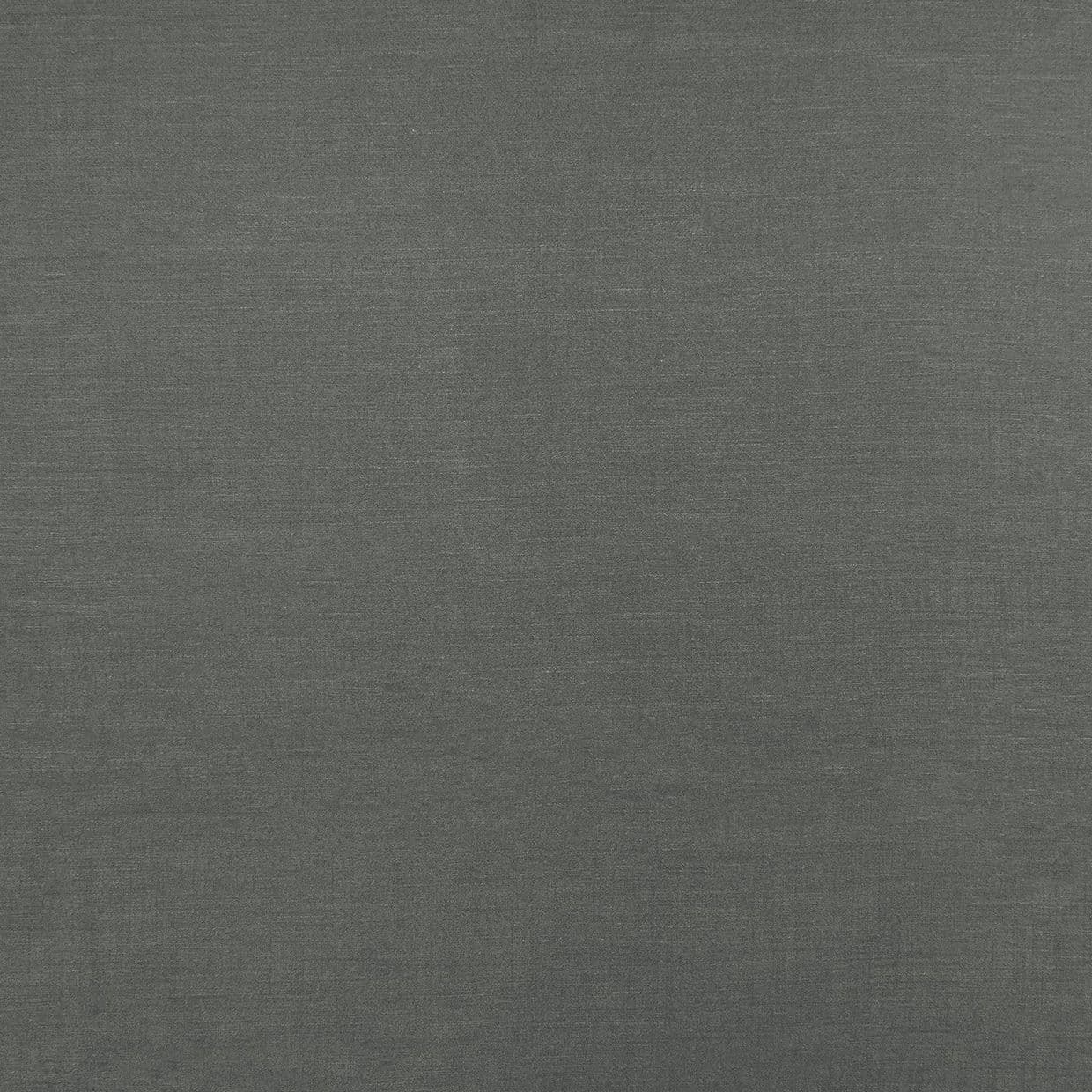Dark gray woven fabric roller blind, fully lowered and smooth; filtering light and blocking view; fills the frame with uniform texture under neutral indoor lighting, no other room features visible.