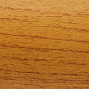 Horizontal-grained light oak wooden surface displaying fine dark streaks; smooth finish reflecting warm even light; close-up view with no surrounding objects or visible edges, emphasizing texture and color.