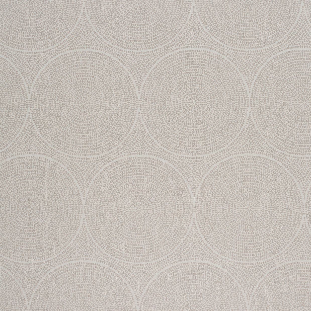 Beige patterned wallpaper with repeated concentric circular medallions, fine dotted texture; lies flat covering a wall, evenly lit close-up, suggesting a quiet, modern interior backdrop.