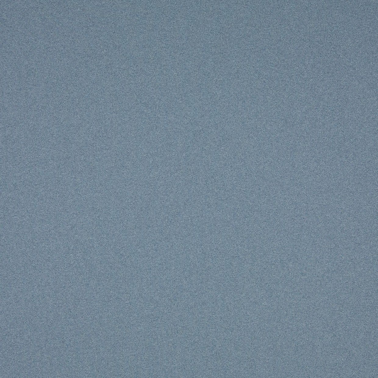 Blue-gray speckled fabric surface filling the frame; lying flat and uniform; fine-grain texture under soft, even lighting with no other visible objects.