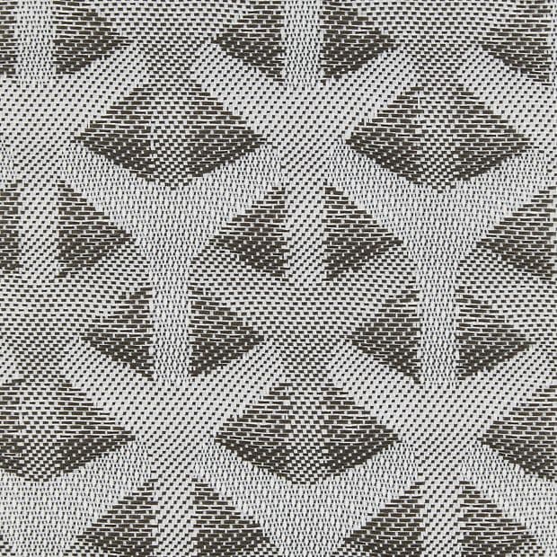 Woven curtain or fabric panel with repeating triangular/chevron motifs, displayed flat to reveal a high-contrast dark-and-light weave; close-up view, evenly lit, no surrounding room visible.