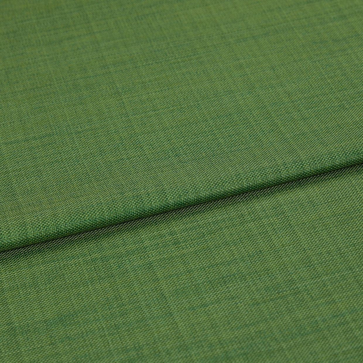 Green woven fabric panel, folded across the frame creating a horizontal ridge; fine textured weave visible, close-up with soft even lighting and neutral background.