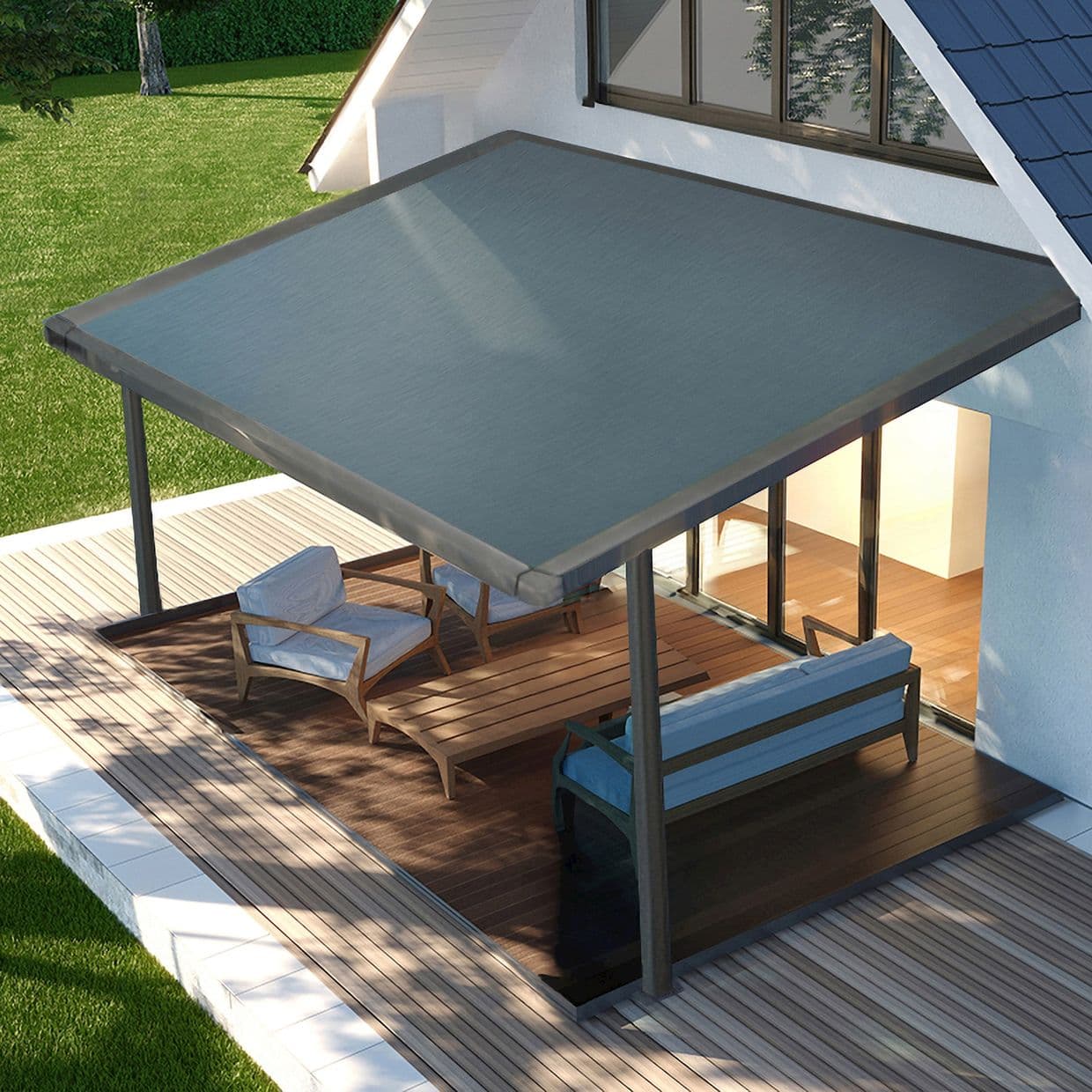 Gray rectangular fabric awning, metal-framed and supported by posts, extended from the house over the deck; shading outdoor seating on a wooden patio adjacent to sliding doors and lawn.