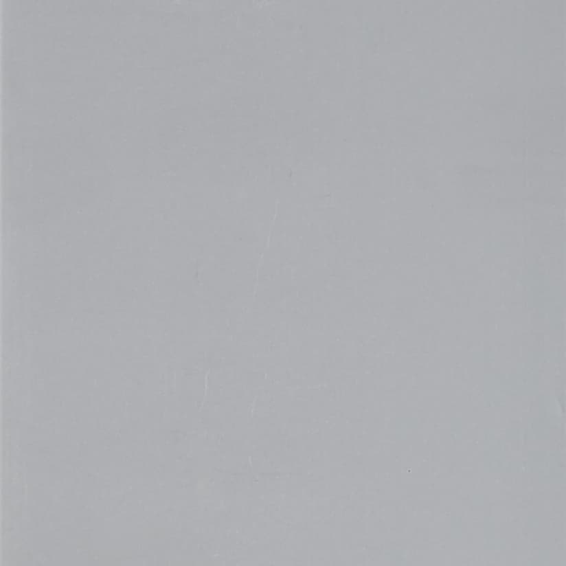 Light gray textured sheet with faint creases occupying the entire frame, lying flat under soft, even lighting with no visible surroundings.