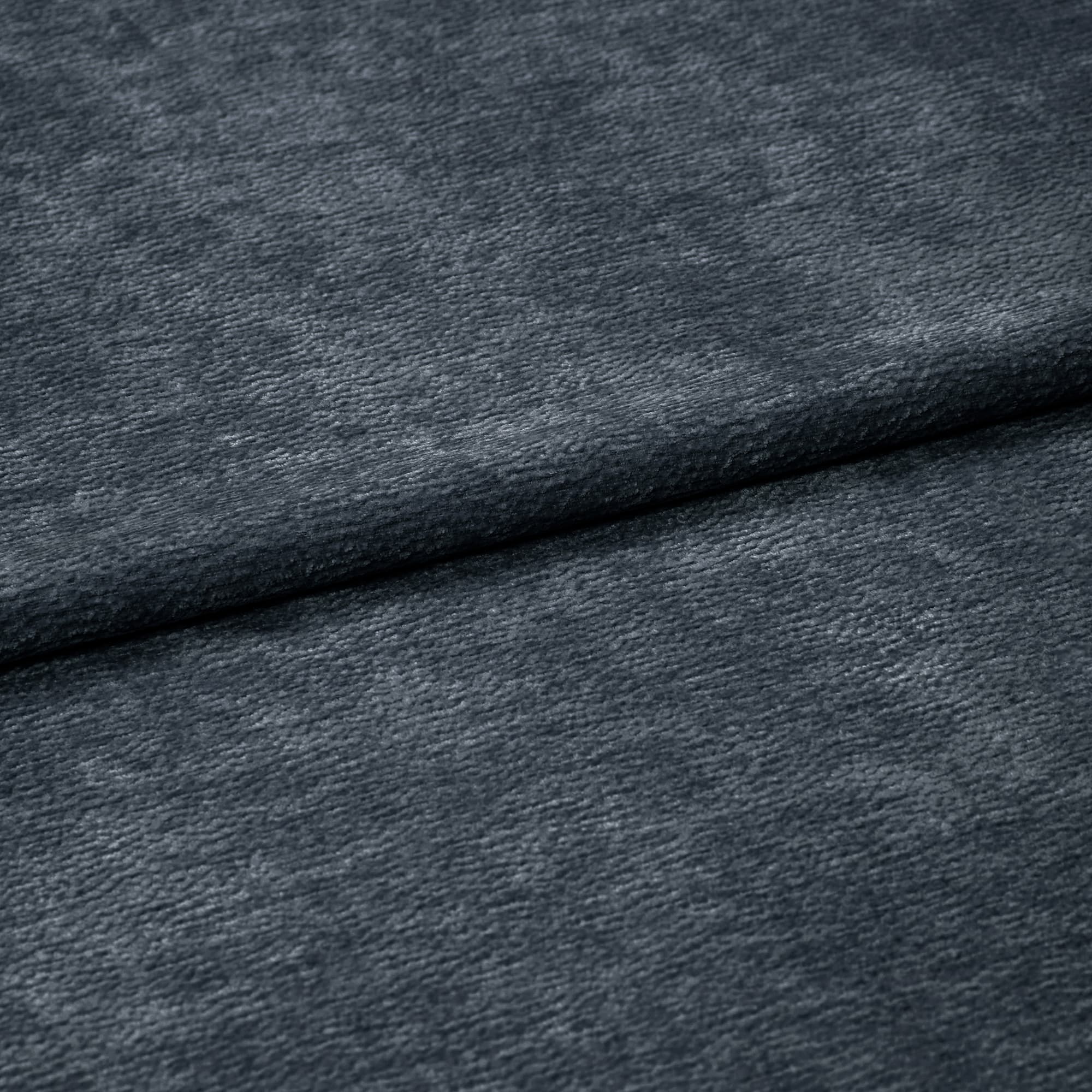 Dark gray textured fabric, folded horizontally with a visible soft nap; draped flat across a surface in a close-up, evenly lit composition with no surrounding context.
