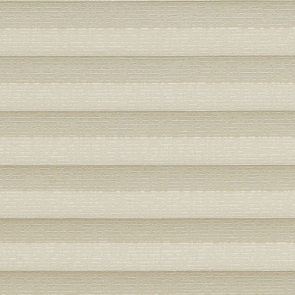 Honeycomb cellular shade, fully lowered with wide textured beige horizontal pleats; closed, softly diffusing warm daylight into a neutral interior and obscuring any exterior view.