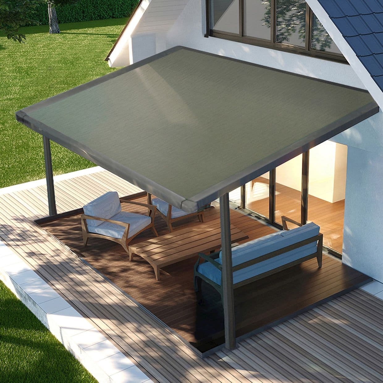 Retractable gray fabric awning, extended and taut on a metal frame above sliding glass doors; shading a wooden deck with lounge chairs, filtering daylight from a sunlit backyard lawn.