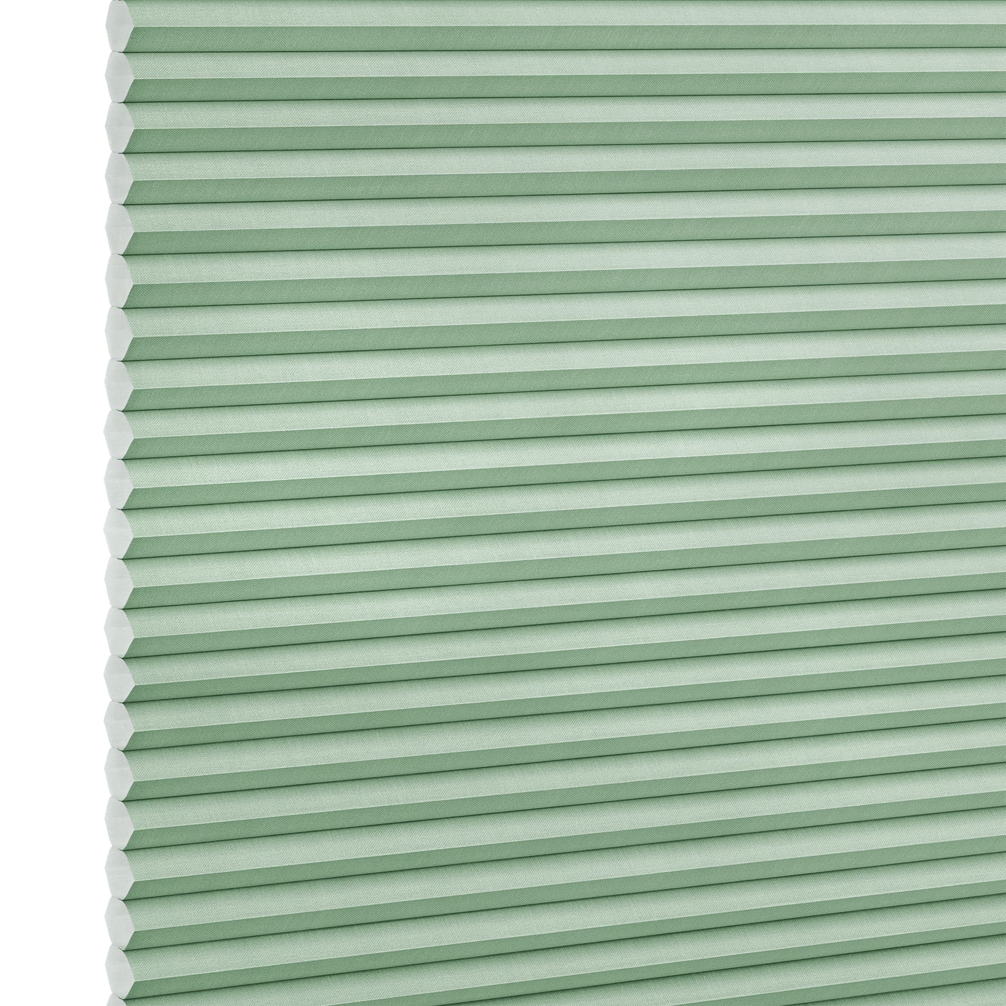 Mint-green honeycomb cellular blind with horizontal pleats and white hexagonal edges, fully closed, blocking view; close-up, flat-lit studio background, no room or window frame visible.