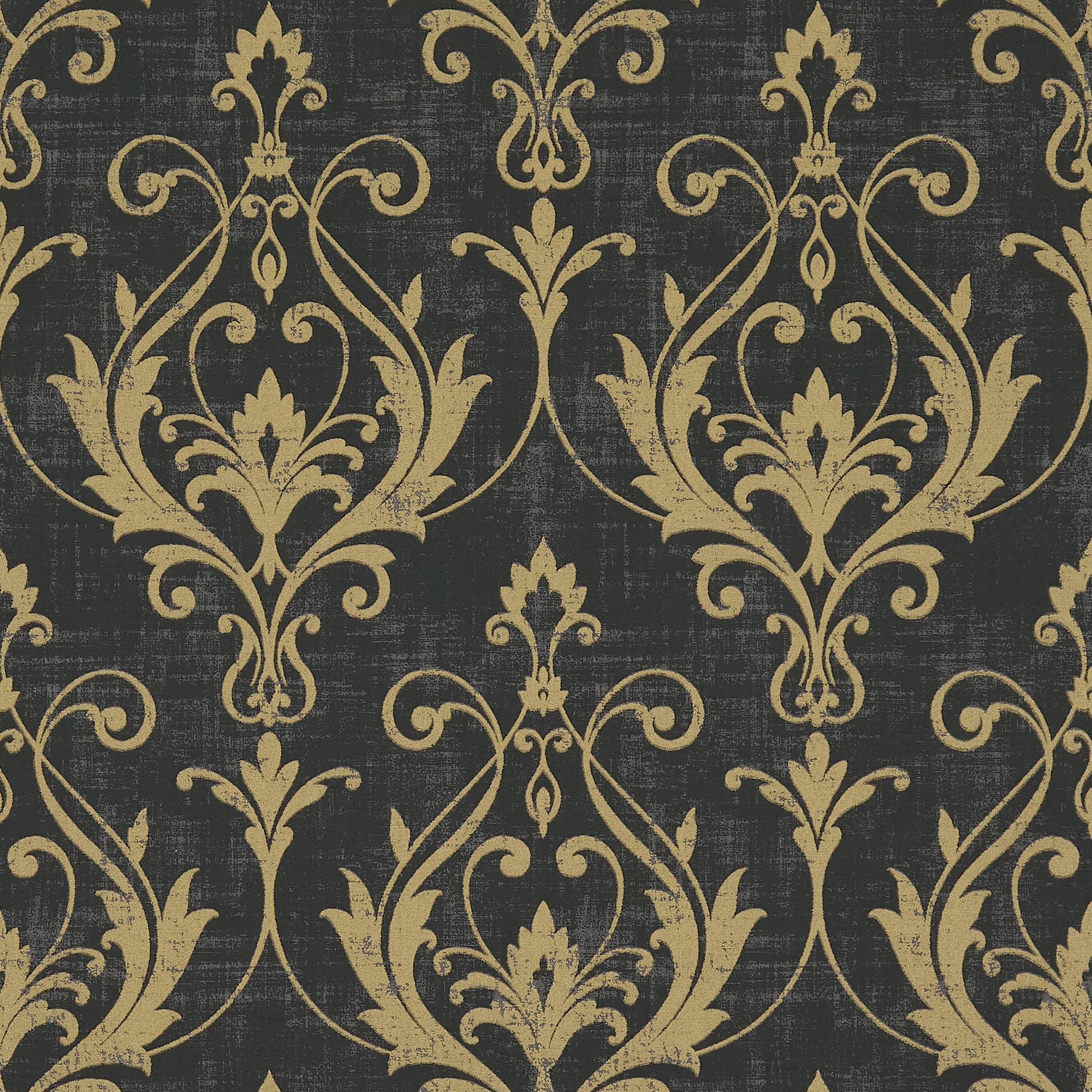 Ornate gold damask motifsâ€”stylized leaves and scrolling flourishesâ€”repeat symmetrically, adorning a flat, distressed charcoal wall surface, suggesting vintage, formal wallpaper in a dimly lit interior.
