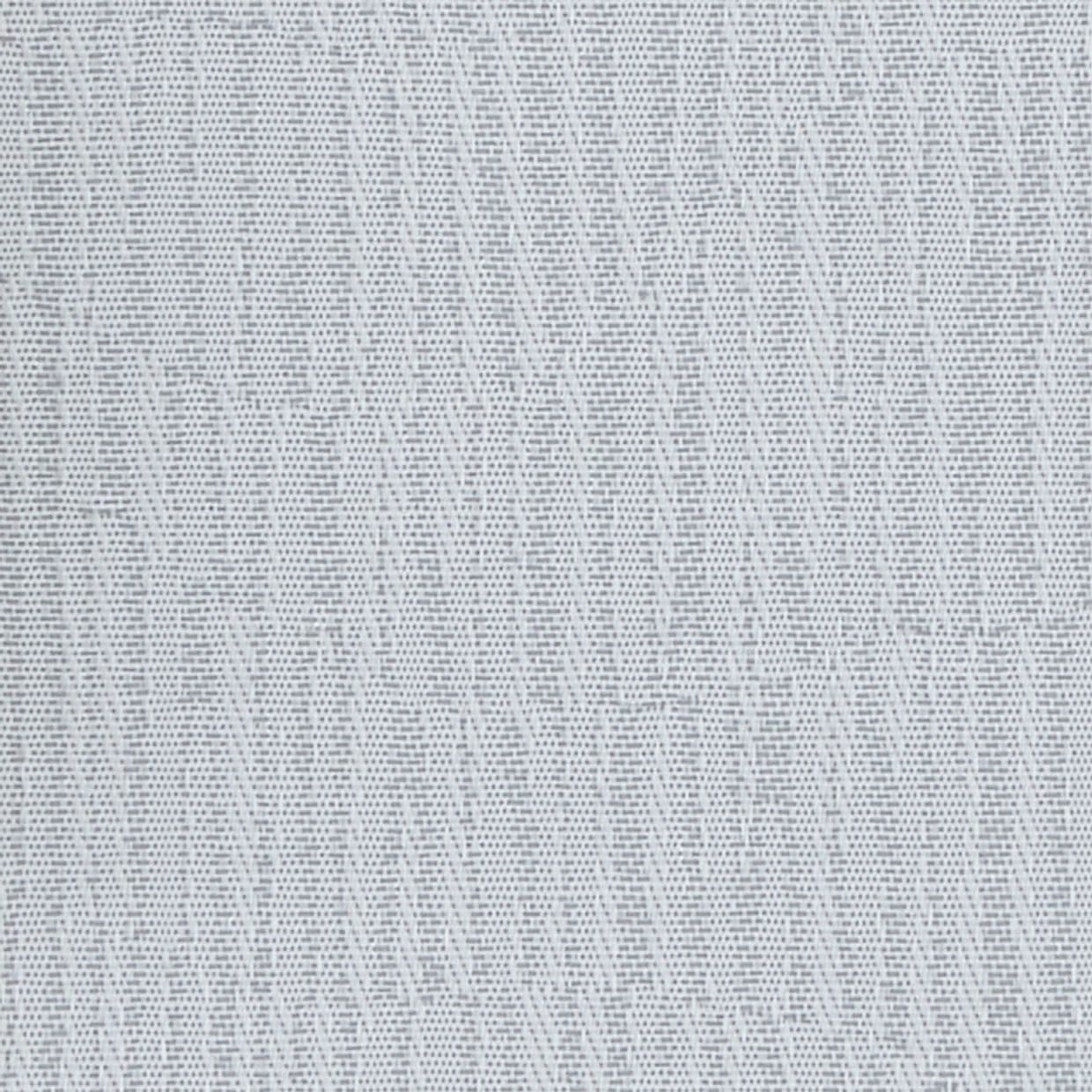 A pale, perforated fabric with tiny, evenly spaced dots and faint diagonal seams â€” stretched flat â€” close-up of a textured surface, evenly lit with soft, diffuse indoor light.