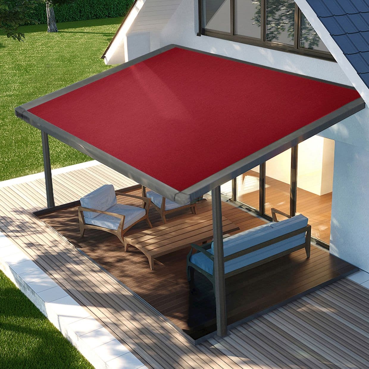 Rectangular red fabric awning stretched over a metal frame, supported by two posts â€” shading a wooden deck patio; outdoor seating beside sliding glass doors, daytime sunlight and lawn view.
