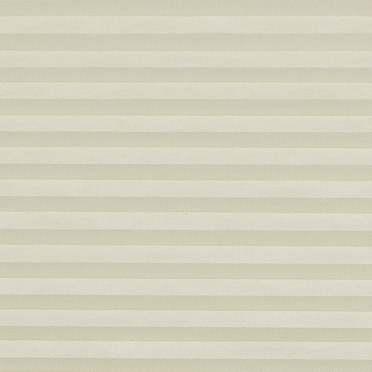 Beige honeycomb (cellular) pleated blind spans the frame, closed in even horizontal bands, softly diffusing light; plain interior setting with neutral lighting and no visible view.