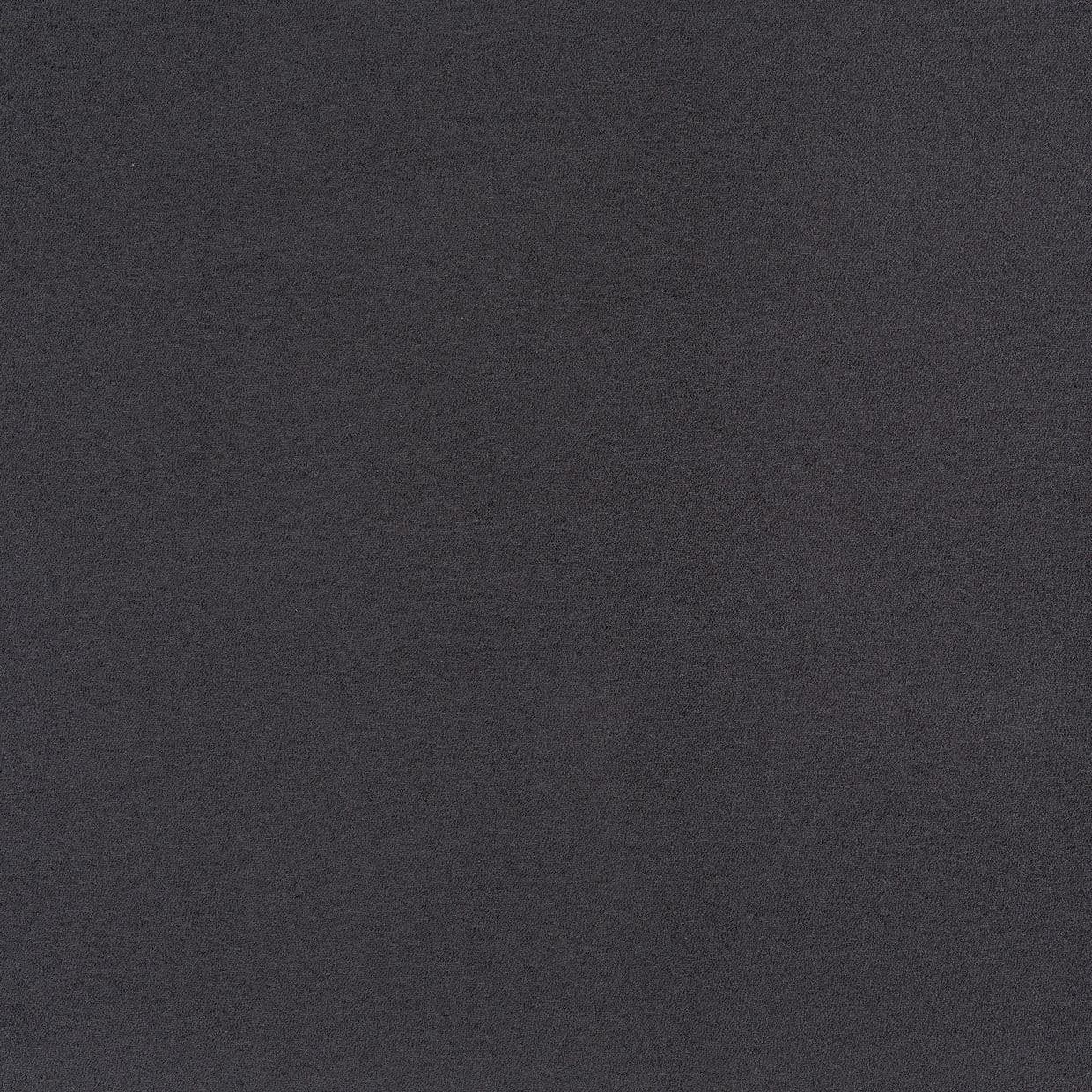 Dark charcoal, finely textured fabric covering the entire frame, showing subtle grain and uniform noise; appearing flat and evenly lit with no visible edges, patterns, or context clues.