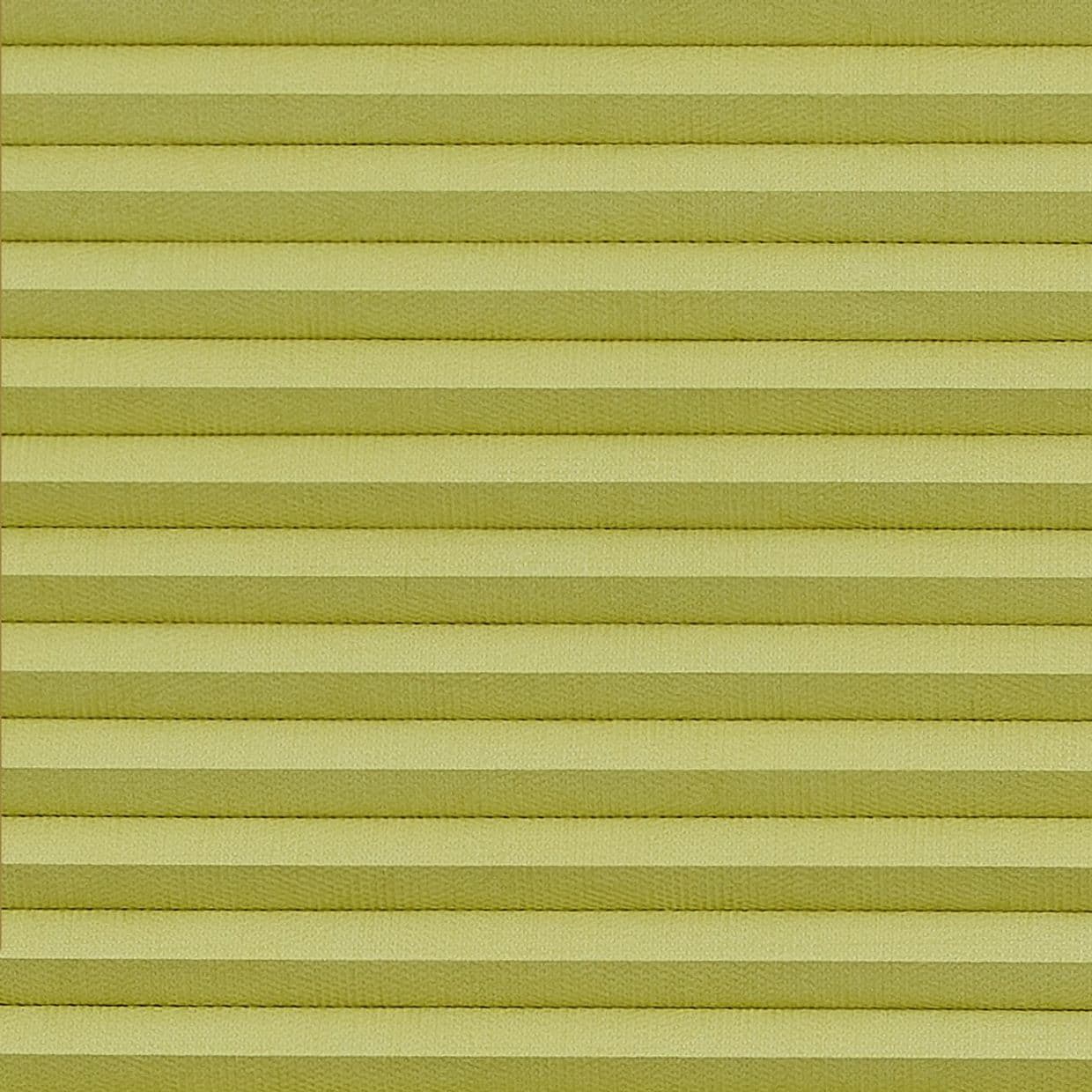Horizontal pleated blinds (pale yellowâ€‘green), fully lowered and closed with evenly spaced folds, filtering diffuse indoor light and filling the window area; no view visible.