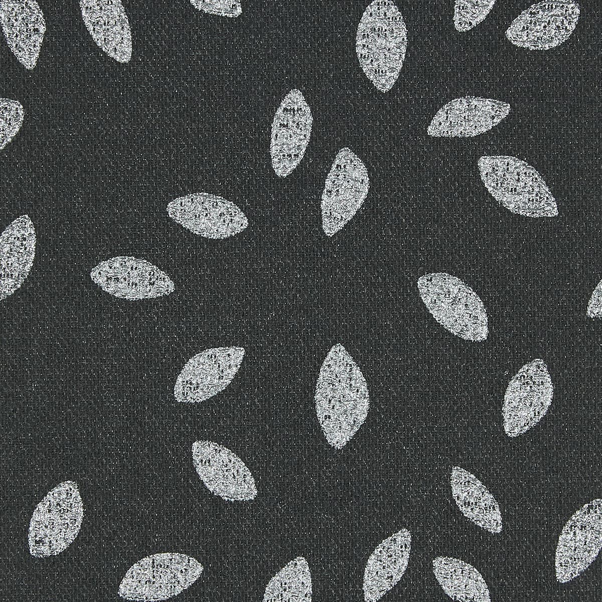 Dark charcoal woven fabric patterned with scattered white, textured leaf-shaped ovals; motifs roughly evenly spaced, creating a repeating decorative design; close-up, flat diffuse lighting and no visible surroundings.