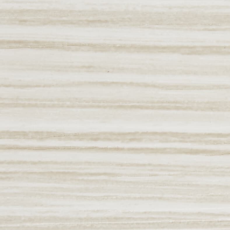 Beige horizontal wood-grain paneling, with subtle pale stripes running across the surface, covering the entire frame and suggesting a light, neutral wall or tabletop under soft, diffuse lighting.