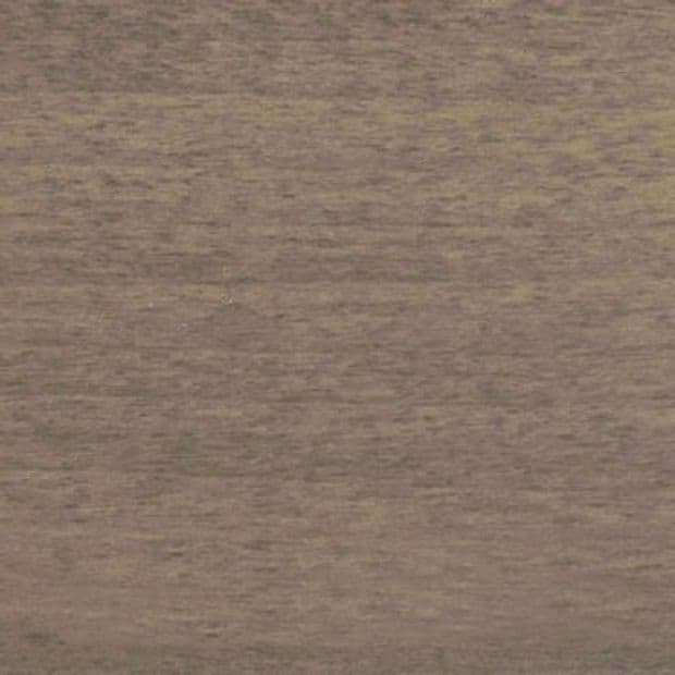 Brown textured surface with fine horizontal grain, occupying the entire frame; close-up view under neutral lighting with no other objects or contextual details visible.