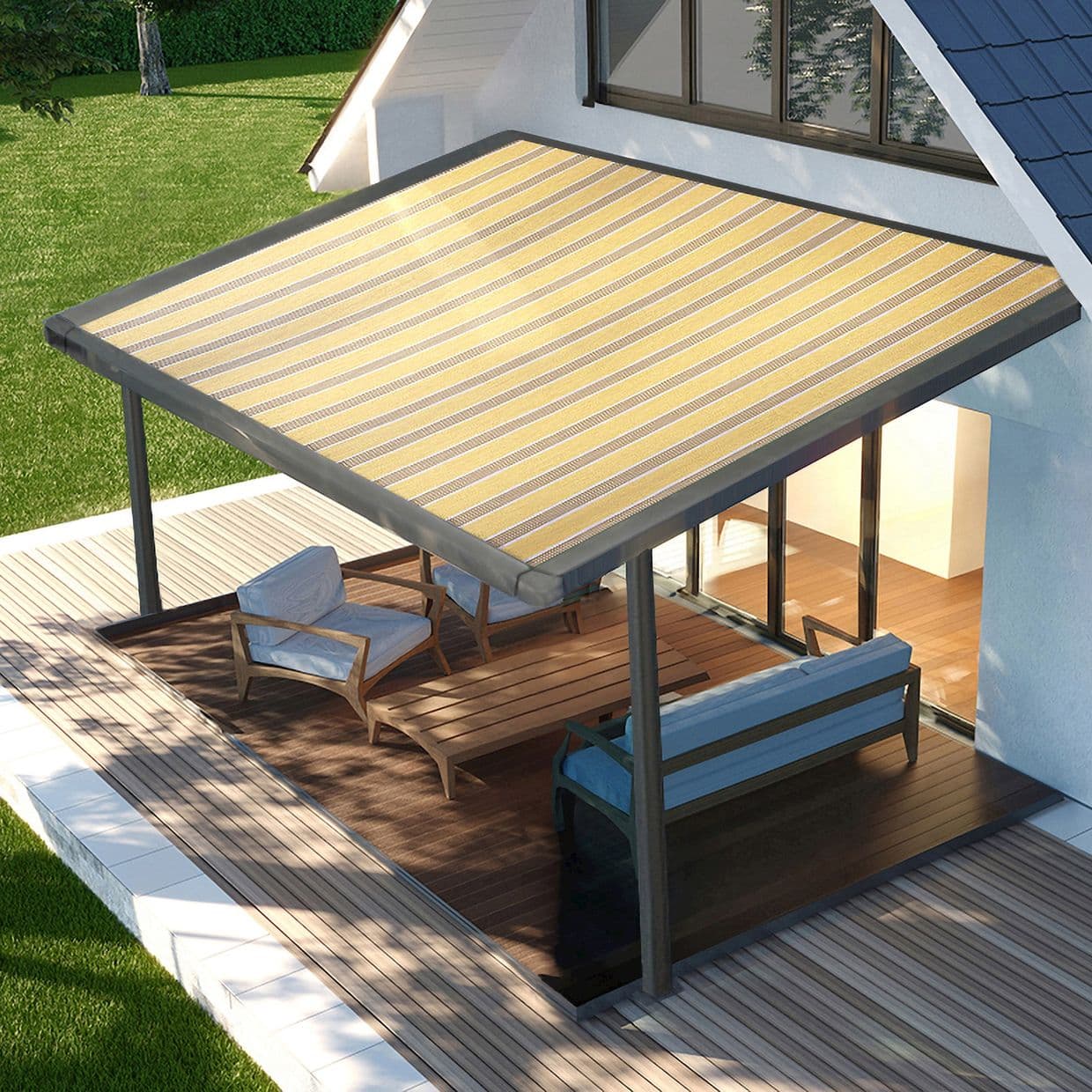 Striped yellow-beige retractable awning, extended from the house and supported by metal posts, shading a wooden deck seating area with lounge chairs and sofa beside glass sliding doors in daylight.