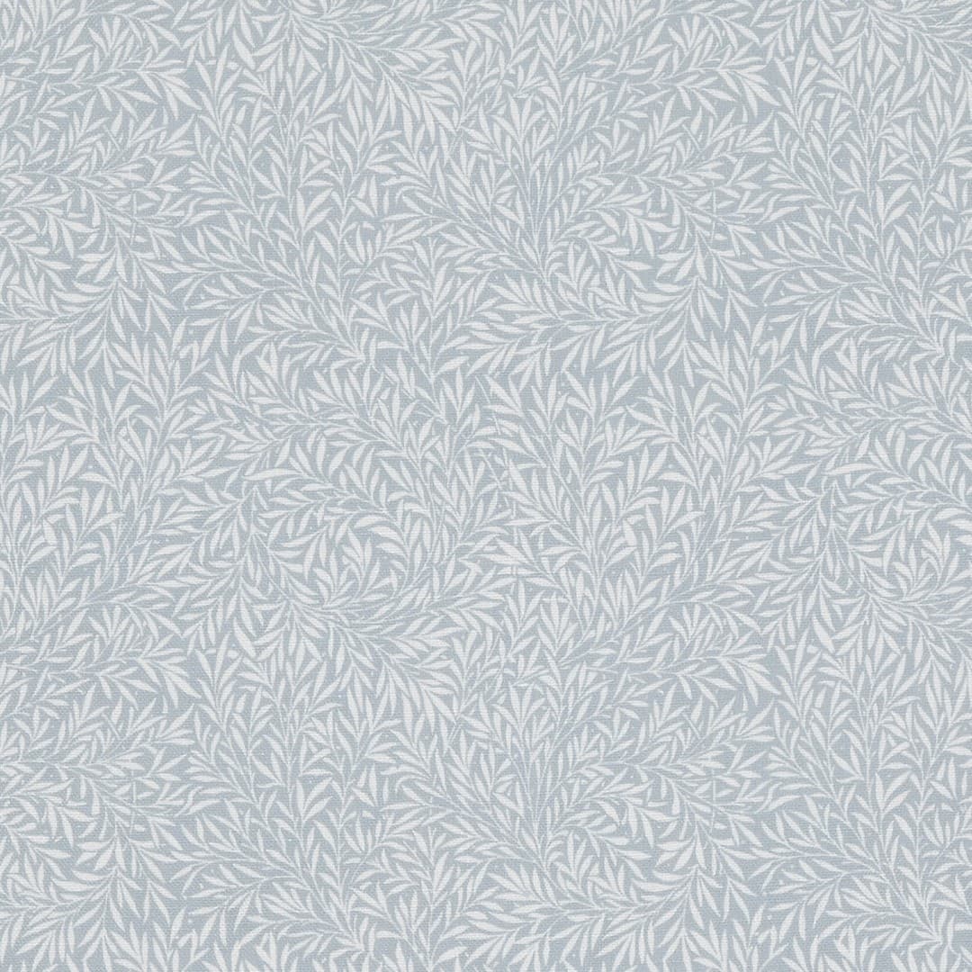 Printed wallpaper with a pale blue background and dense, swirling white leaf motif; covering a wall uniformly, producing a subtle textured, fabric-like appearance; decorative, calm interior surface.