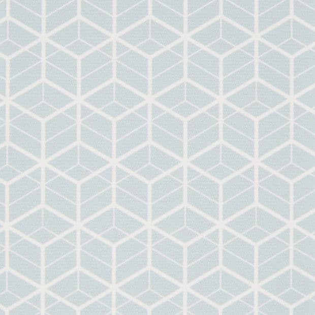 Geometric wallpaper with white isometric cube pattern on a pale blue background; repeating motif covers the surface, decorating an interior wall under soft, even lighting with no other visible objects.