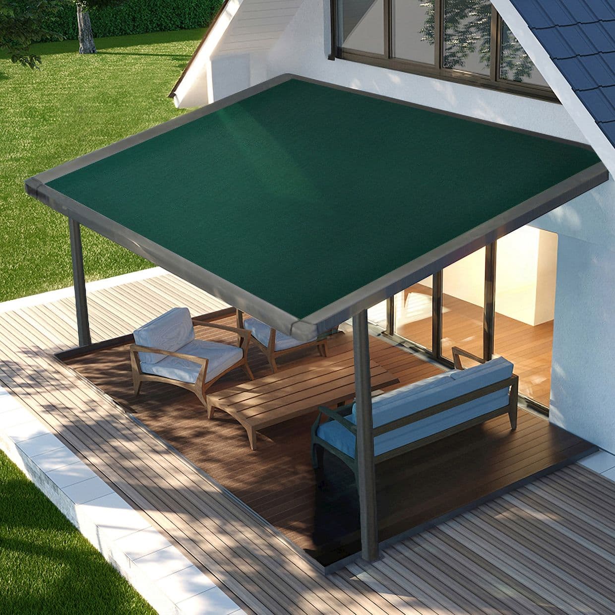 Dark green flat awning with metal frame, supported by two posts â€” shading a wooden patio and lounge seating, outside a modern house with glass sliding doors and a grassy lawn.