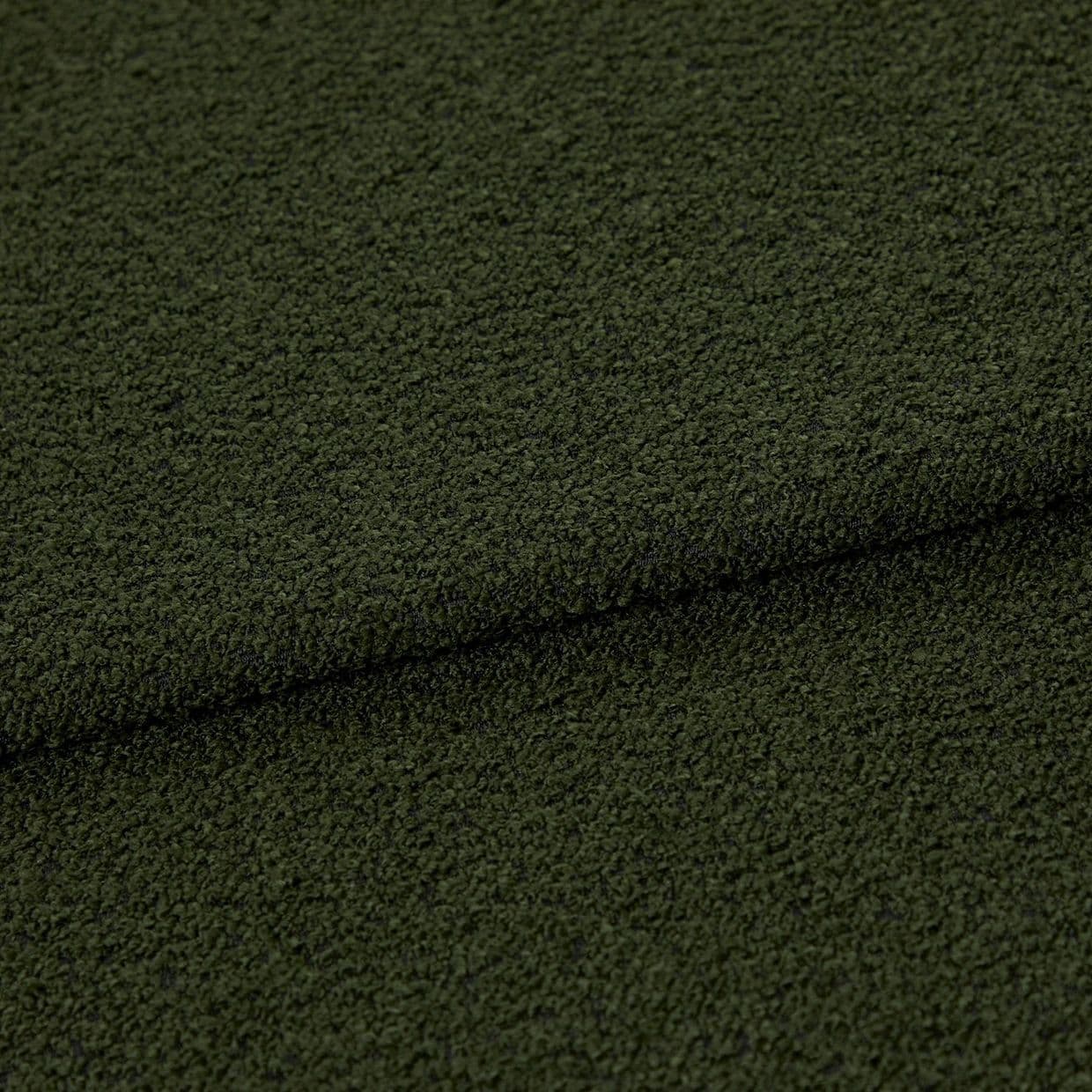 Dark oliveâ€‘green bouclÃ© fabric, folded in a shallow horizontal overlap, showing dense looped texture; close-up studio view emphasizing a tactile, slightly shadowed surface.