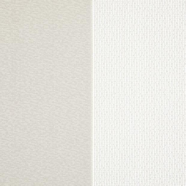 Two vertical curtain panels â€” left pale beige smooth, right narrow white panel with fine vertical textured pattern â€” hung side-by-side meeting at center, close-up, soft even lighting.