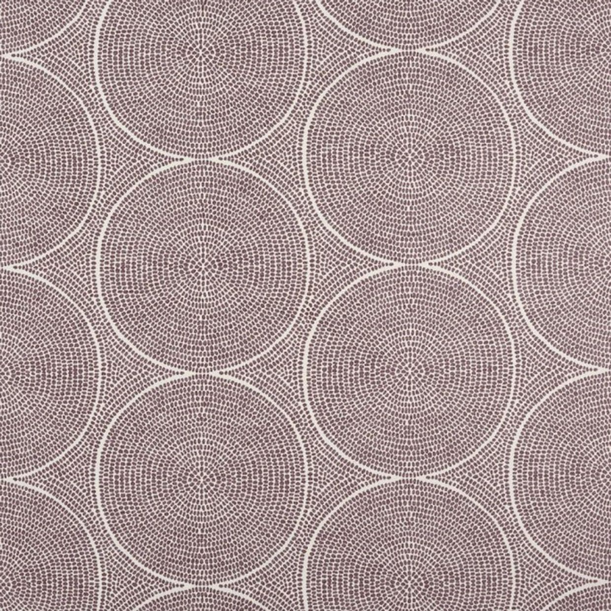 Wallpaper with overlapping concentric-circle pattern of tiny mauve dots forming large white-outlined circles; covering a flat wall surface, decorative geometric motif in soft, even lighting.
