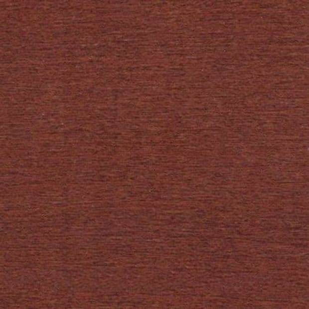 Reddish-brown textured surface with fine horizontal striations fills the frame, lying flat and uniform, evenly lit in neutral light with no visible seams or surrounding context.