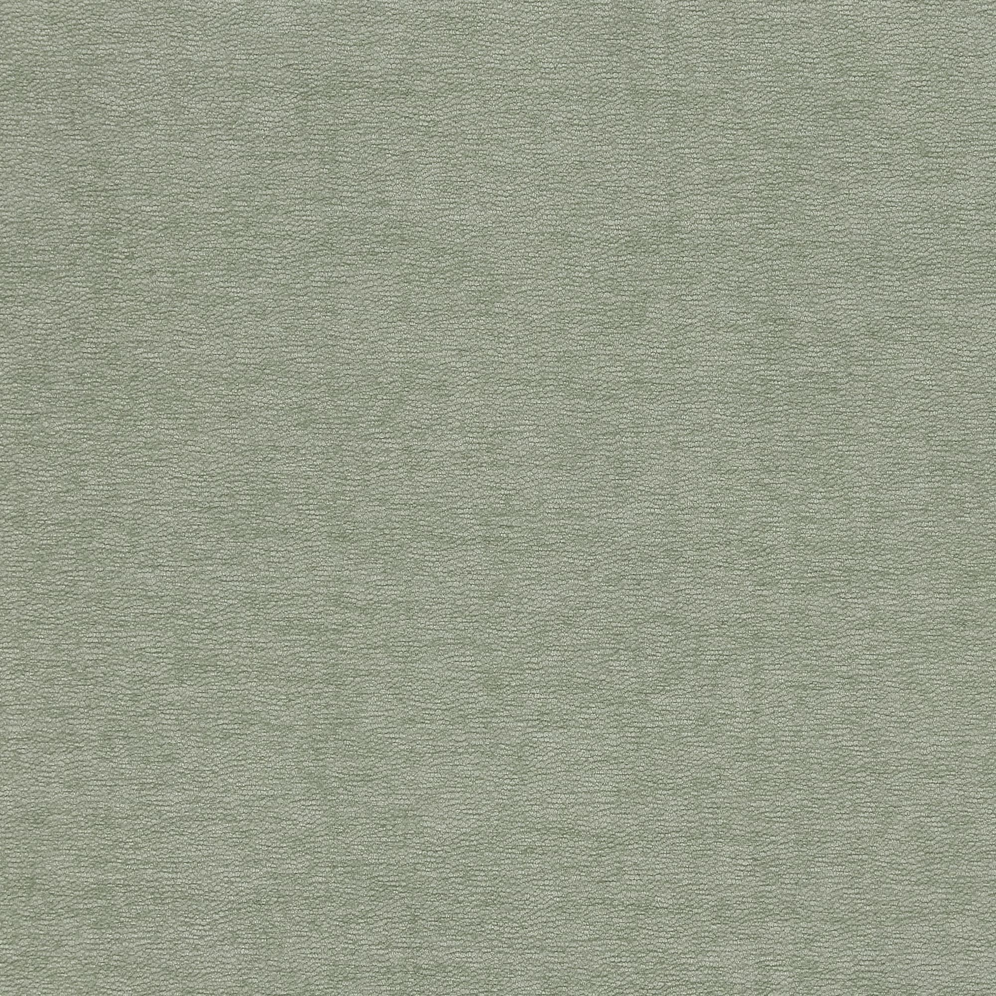 Pale sage-green, pebble-textured fabric covering the entire frame; lying flat and uniformly lit, suggesting a close-up of upholstery or textured paper under soft, diffuse indoor light.