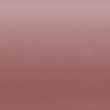 Dusty rose fabric-like panel fills the frame, showing a subtle horizontal gradient and fine texture, evenly lit against a neutral, featureless background with soft, diffuse light.