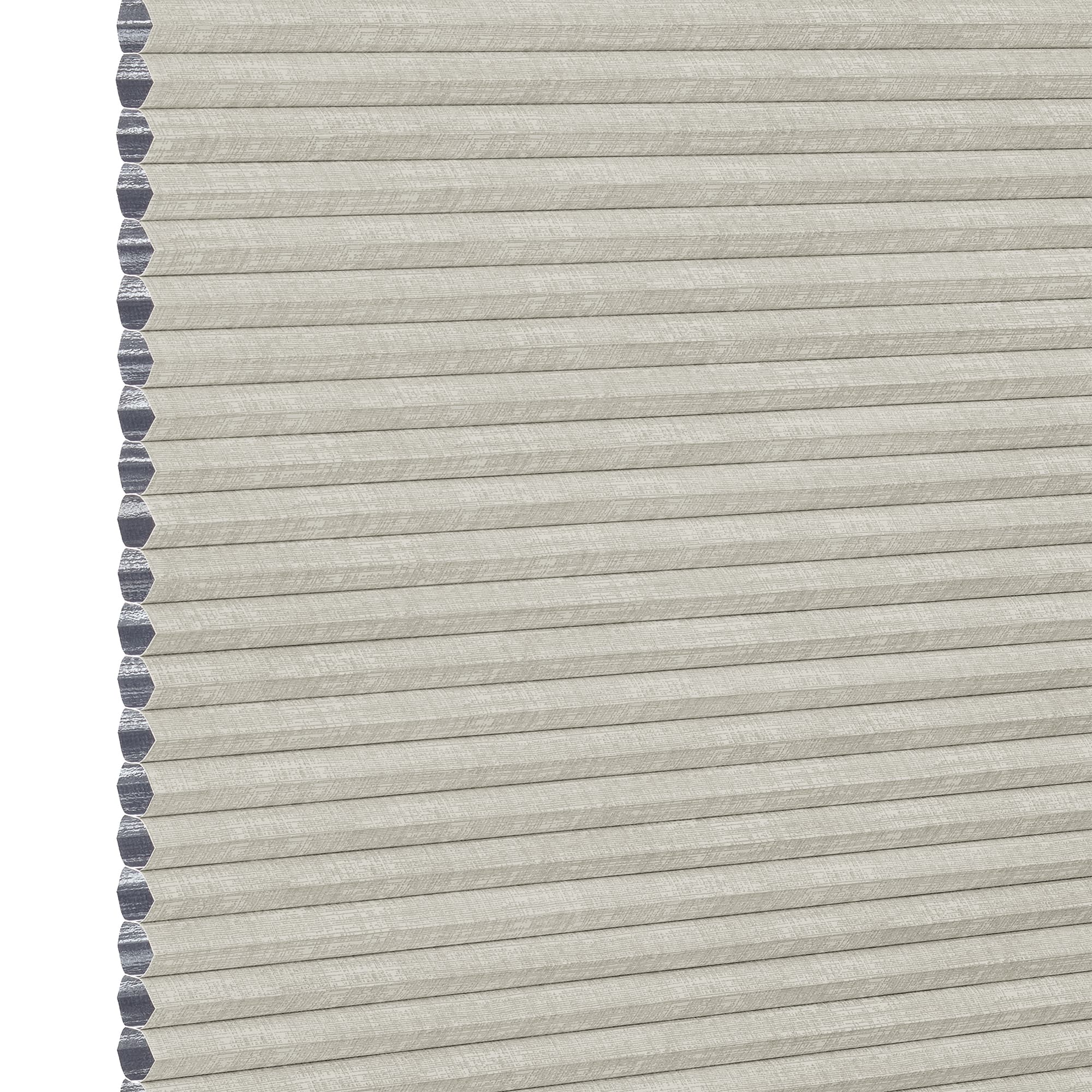 Light beige honeycomb cellular shade with pleated fabric and exposed hexagonal cell ends at left, fully lowered and closed, concealing view; close-up product-style shot on white background with even lighting.