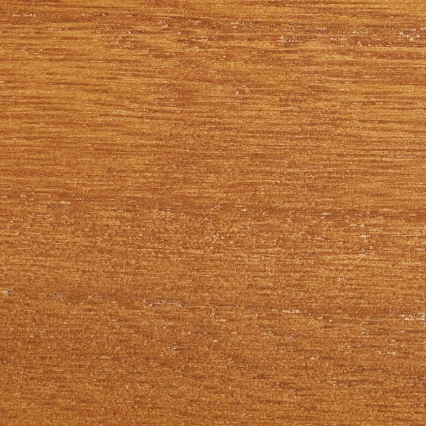 Close-up of a warm orange-brown wooden veneer showing fine horizontal grain and slight scratches, filling the frame with even lighting and a matte, lightly textured surface.