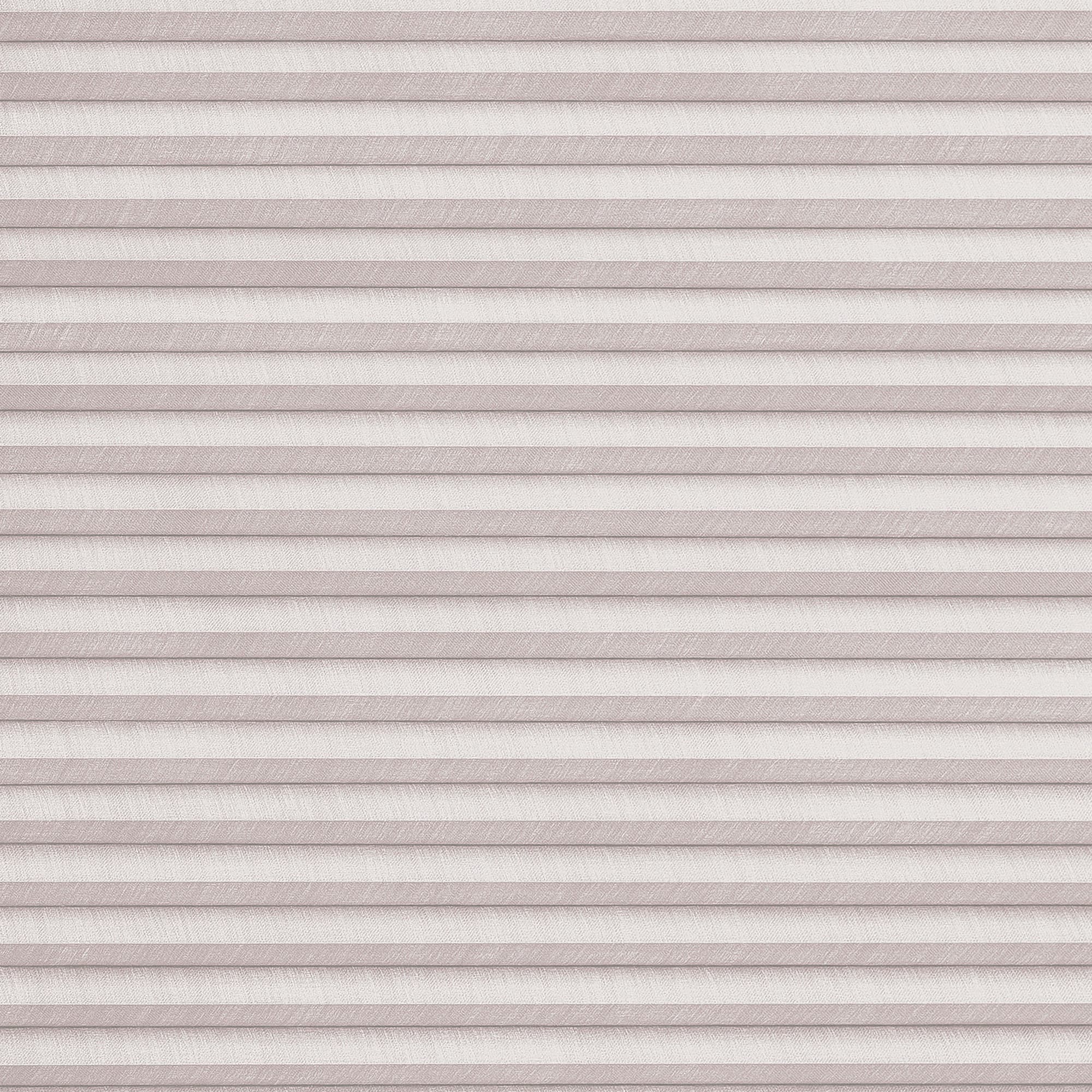 Horizontal pleated cellular blinds, full-width and fully lowered, pale blush textured fabric; closed and filtering soft diffuse light, concealing the window and creating a uniformly lit, neutral interior surface.